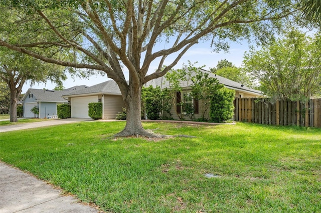 1979 NW 86th Ter, Gainesville, FL 32606 - view of front facade featuring driveway and an attached garage