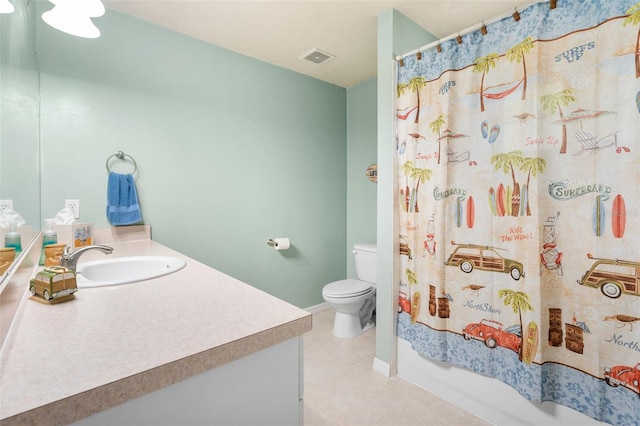 1979 NW 86th Ter, Gainesville, FL 32606 - bathroom featuring vanity, tile patterned floors, toilet, shower / tub combo with curtain, and baseboards