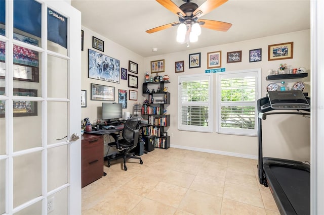 1979 NW 86th Ter, Gainesville, FL 32606 - office area featuring ceiling fan, light tile patterned floors, and baseboards