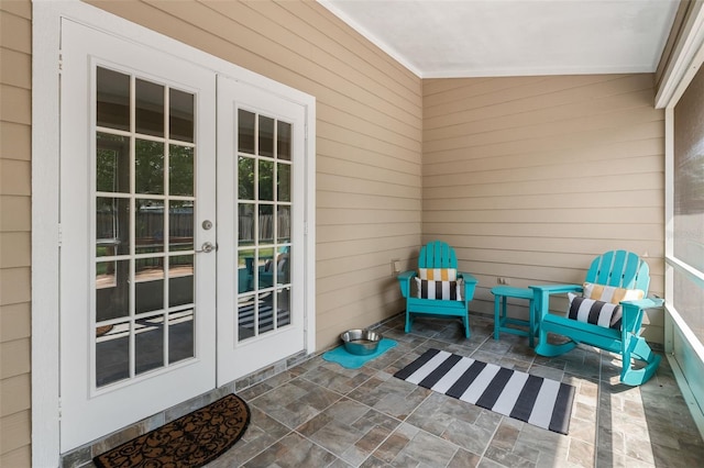 1979 NW 86th Ter, Gainesville, FL 32606 - property entrance with french doors and a patio area