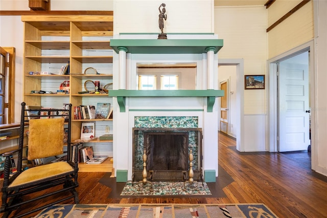 502 NE Cholokka Blvd, Micanopy, FL 32667 - living area with wood finished floors and a fireplace