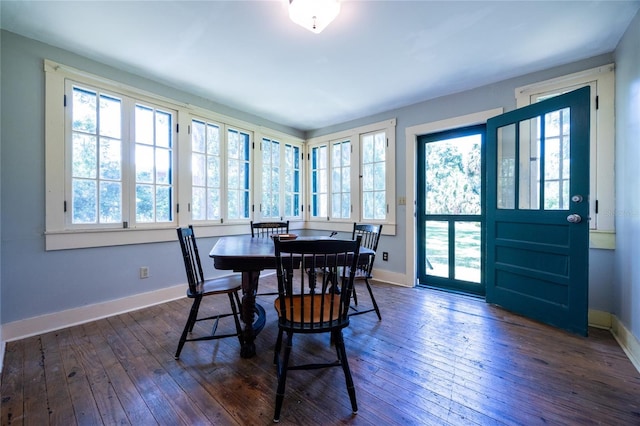 502 NE Cholokka Blvd, Micanopy, FL 32667 - dining area featuring healthy amount of natural light, baseboards, and dark wood-type flooring