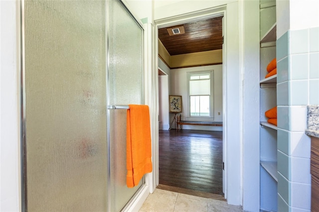 502 NE Cholokka Blvd, Micanopy, FL 32667 - corridor featuring tile patterned floors and wooden ceiling