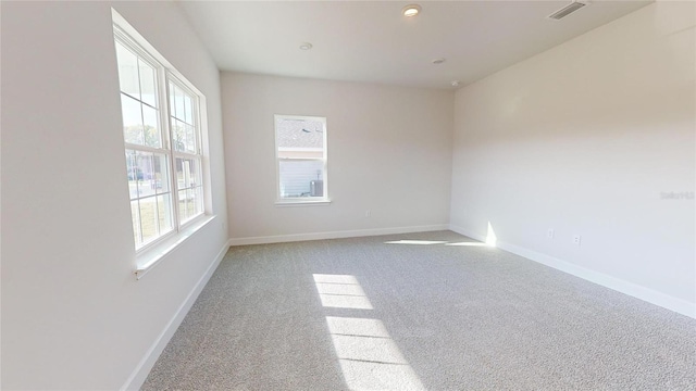 3279 E Iris Ln, Bell, FL 32619 - empty room featuring light colored carpet and baseboards