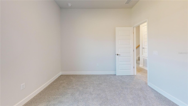 3279 E Iris Ln, Bell, FL 32619 - empty room with light colored carpet and baseboards