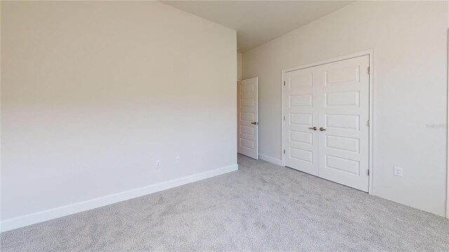3279 E Iris Ln, Bell, FL 32619 - spare room featuring carpet and baseboards