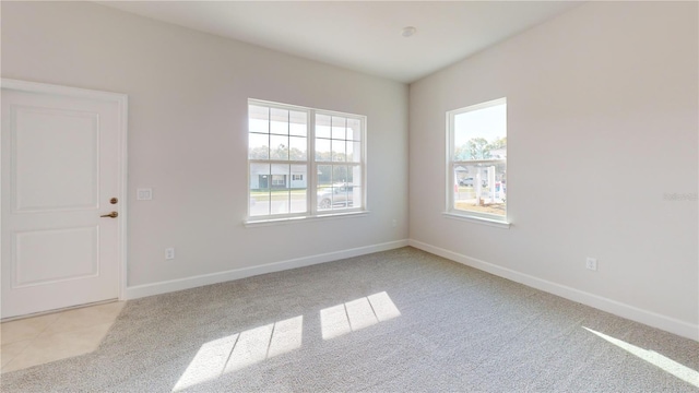 3279 E Iris Ln, Bell, FL 32619 - unfurnished room with plenty of natural light, light colored carpet, and baseboards