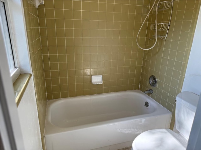 532 NE 7th Ter, Gainesville, FL 32601 - bathroom featuring toilet and bathing tub / shower combination