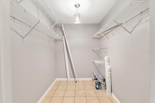 2360 SW Archer Rd Unit 1102, Gainesville, FL 32608 - spacious closet featuring light tile patterned floors