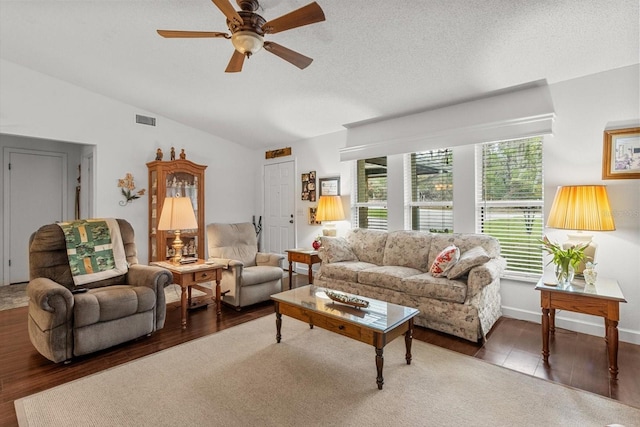 1786 S Border Ave, Inverness, FL 34452 - living area featuring a ceiling fan, vaulted ceiling, wood finished floors, and a textured ceiling