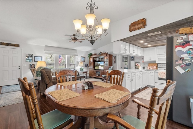 1786 S Border Ave, Inverness, FL 34452 - dining area with a chandelier, dark wood-style floors, and a ceiling fan