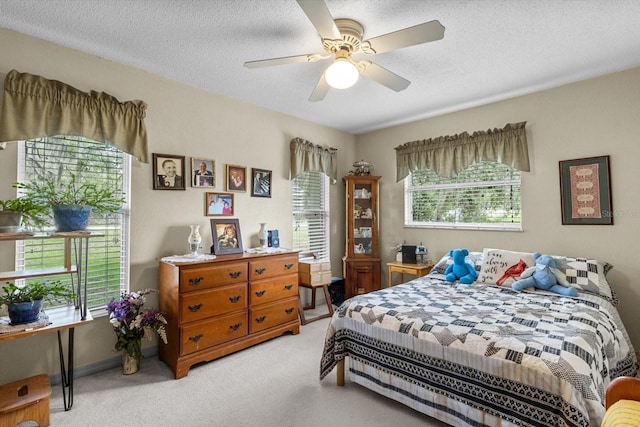 1786 S Border Ave, Inverness, FL 34452 - bedroom featuring light colored carpet, ceiling fan, and a textured ceiling