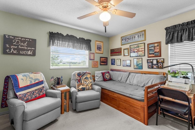 1786 S Border Ave, Inverness, FL 34452 - sitting room with carpet floors, a ceiling fan, and a textured ceiling
