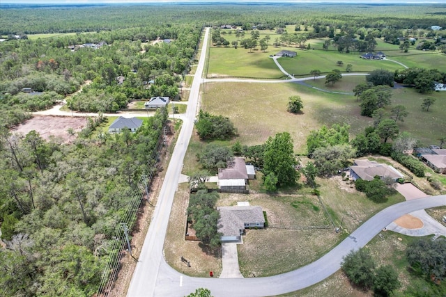 1786 S Border Ave, Inverness, FL 34452 - aerial view of property and surrounding area featuring a heavily wooded area