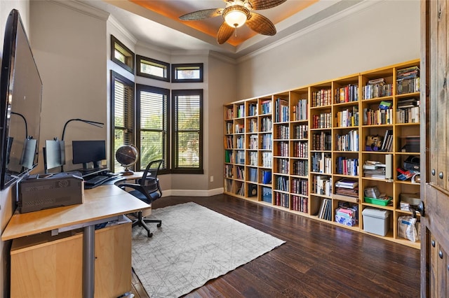 office area featuring crown molding, ceiling fan, baseboards, and wood finished floors