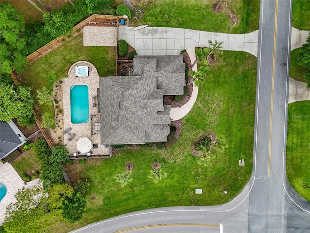 drone / aerial view of a pool area