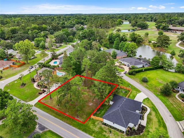 aerial overview of property's location featuring a nearby body of water and property parcel outlined