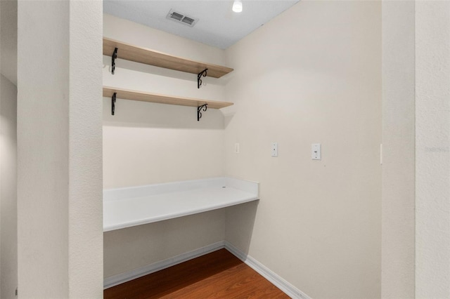 10000 SW 52nd Ave Unit J50, Gainesville, FL 32608 - spacious closet featuring wood finished floors