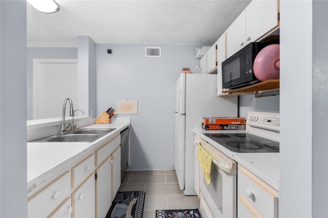 kitchen featuring white electric stove, a sink, dishwasher, black microwave, and light countertops