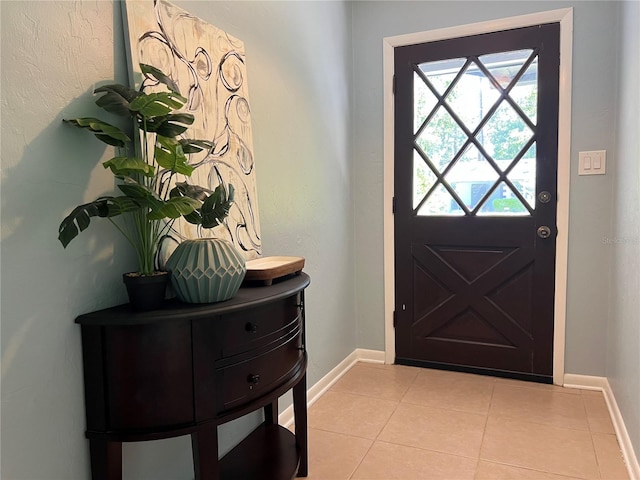 5610 NW 29th Ter, Gainesville, FL 32653 - entrance foyer featuring light tile patterned flooring and baseboards