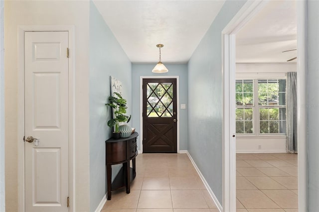 5610 NW 29th Ter, Gainesville, FL 32653 - entrance foyer featuring light tile patterned floors and baseboards