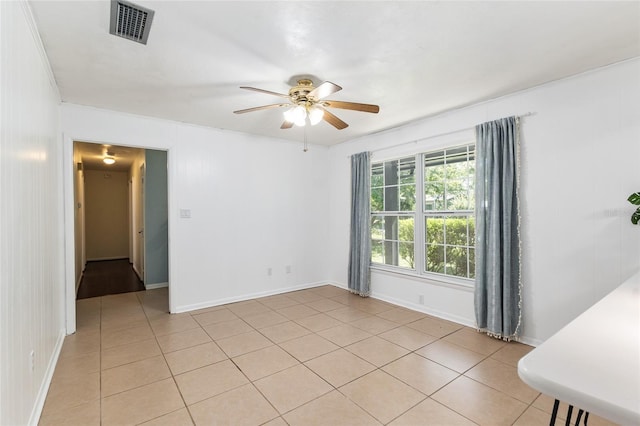 5610 NW 29th Ter, Gainesville, FL 32653 - spare room featuring ceiling fan and light tile patterned floors