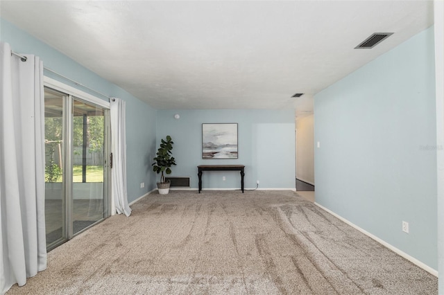 5610 NW 29th Ter, Gainesville, FL 32653 - carpeted living room with baseboards