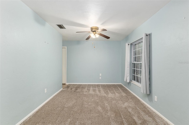 5610 NW 29th Ter, Gainesville, FL 32653 - carpeted spare room featuring ceiling fan and baseboards