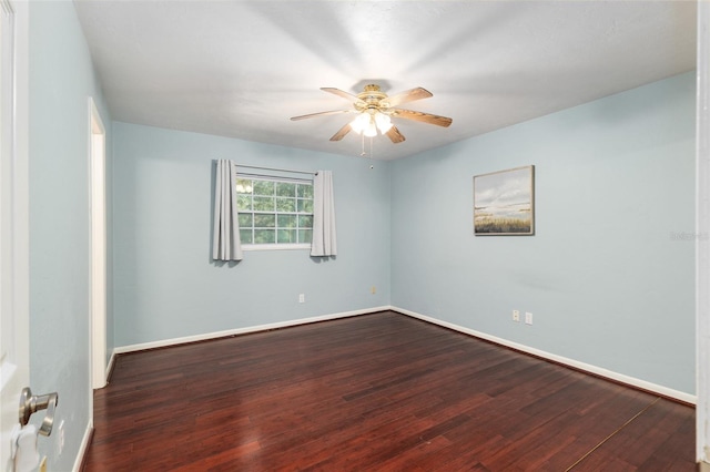 5610 NW 29th Ter, Gainesville, FL 32653 - spare room with a ceiling fan and dark wood finished floors