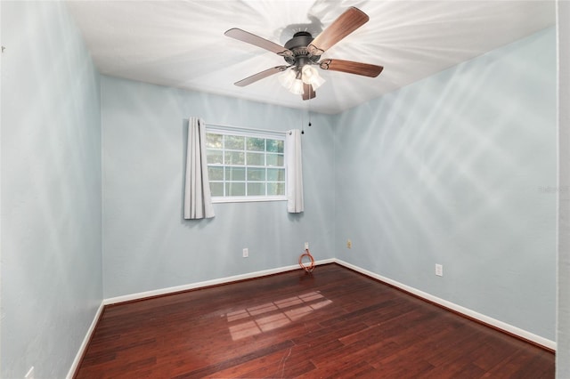 5610 NW 29th Ter, Gainesville, FL 32653 - spare room featuring wood finished floors and a ceiling fan