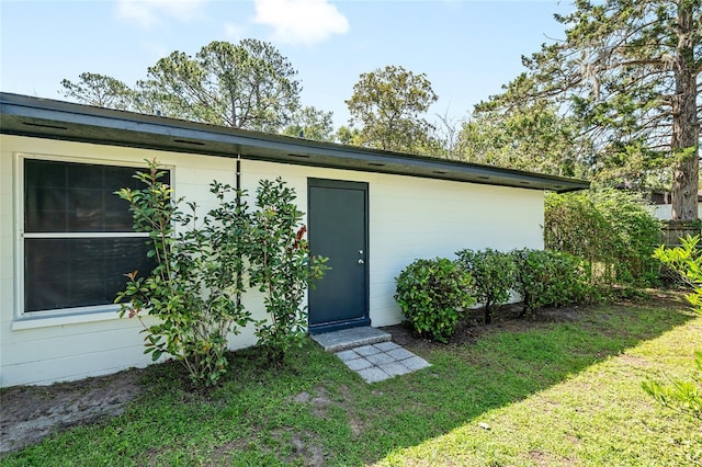5610 NW 29th Ter, Gainesville, FL 32653 - property entrance with a yard