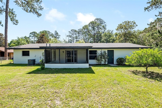 5610 NW 29th Ter, Gainesville, FL 32653 - rear view of house featuring a sunroom