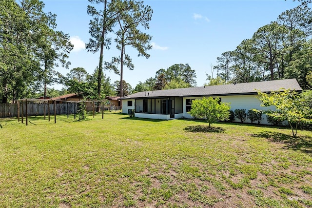 5610 NW 29th Ter, Gainesville, FL 32653 - view of yard featuring a sunroom