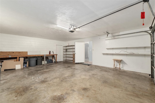 5610 NW 29th Ter, Gainesville, FL 32653 - garage featuring a garage door opener