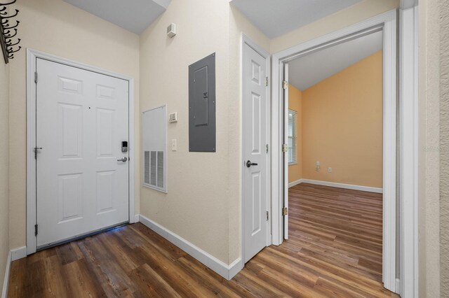 9119 SW 52nd Ave Unit C301, Gainesville, FL 32608 - foyer with electric panel, dark wood-style flooring, and baseboards