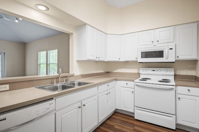 9119 SW 52nd Ave Unit C301, Gainesville, FL 32608 - kitchen with white appliances, a sink, white cabinetry, and recessed lighting