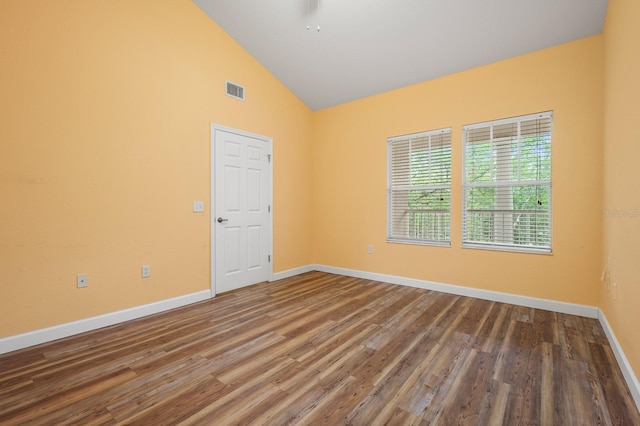 9119 SW 52nd Ave Unit C301, Gainesville, FL 32608 - unfurnished room featuring wood finished floors, baseboards, and high vaulted ceiling
