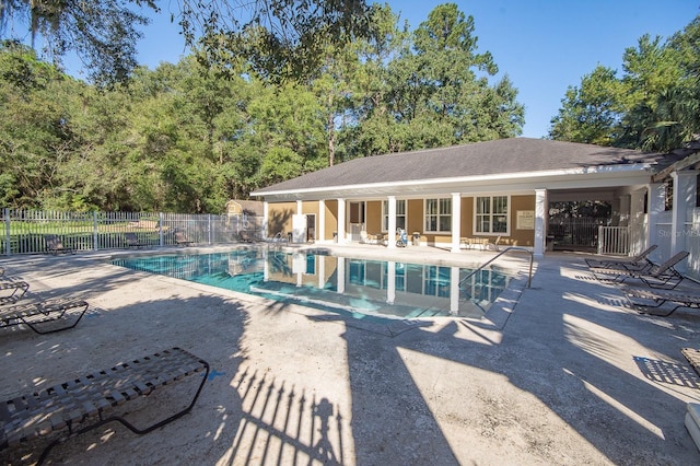 9119 SW 52nd Ave Unit C301, Gainesville, FL 32608 - community pool with a patio