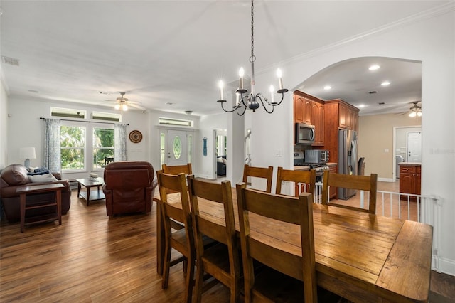 14204 SW 70th St, Archer, FL 32618 - dining space with a ceiling fan, dark wood-style floors, arched walkways, recessed lighting, and plenty of natural light