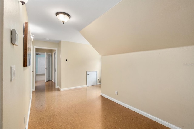 14204 SW 70th St, Archer, FL 32618 - additional living space with baseboards and speckle patterned floor