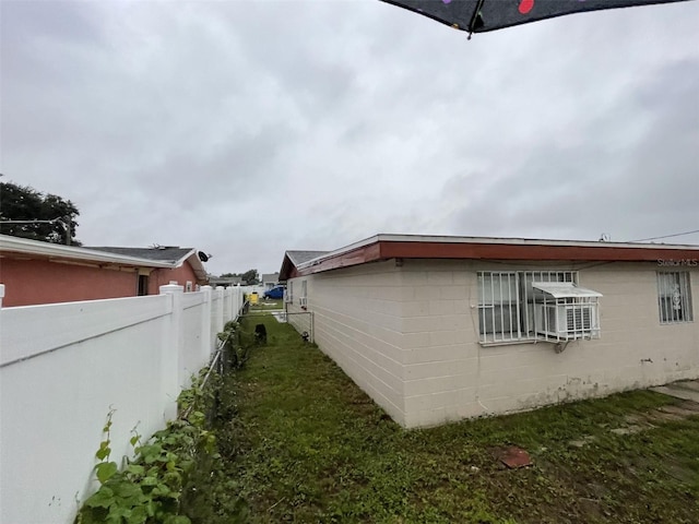 6019 W Fern St, Tampa, FL 33634 - view of side of property featuring fence