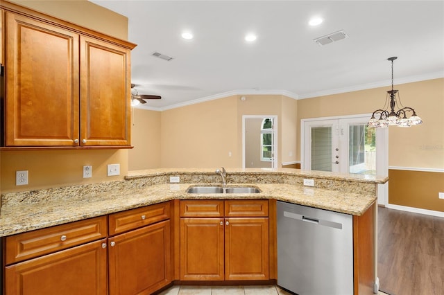 3664 NW 55th Ln, Gainesville, FL 32653 - kitchen featuring stainless steel dishwasher, a sink, ornamental molding, a peninsula, and light stone counters