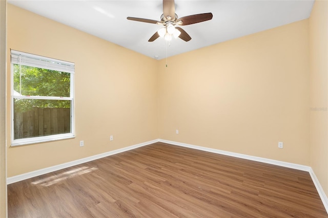3664 NW 55th Ln, Gainesville, FL 32653 - empty room featuring baseboards, wood finished floors, and ceiling fan