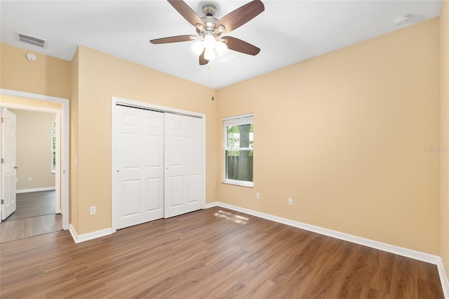 3664 NW 55th Ln, Gainesville, FL 32653 - unfurnished bedroom featuring light wood-type flooring, baseboards, a closet, and ceiling fan
