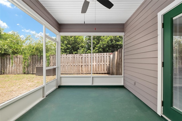 3664 NW 55th Ln, Gainesville, FL 32653 - unfurnished sunroom with a ceiling fan