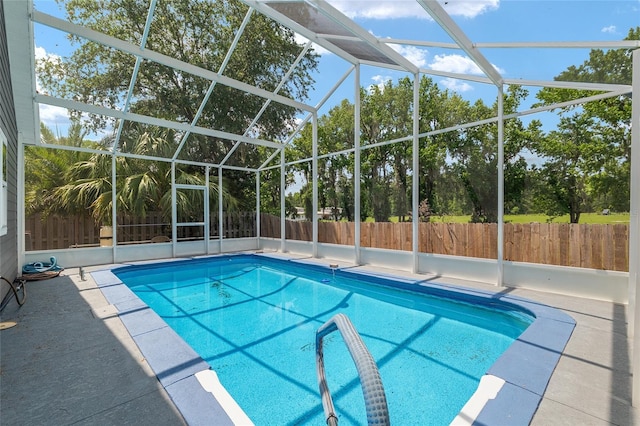 3664 NW 55th Ln, Gainesville, FL 32653 - view of pool with glass enclosure and a patio