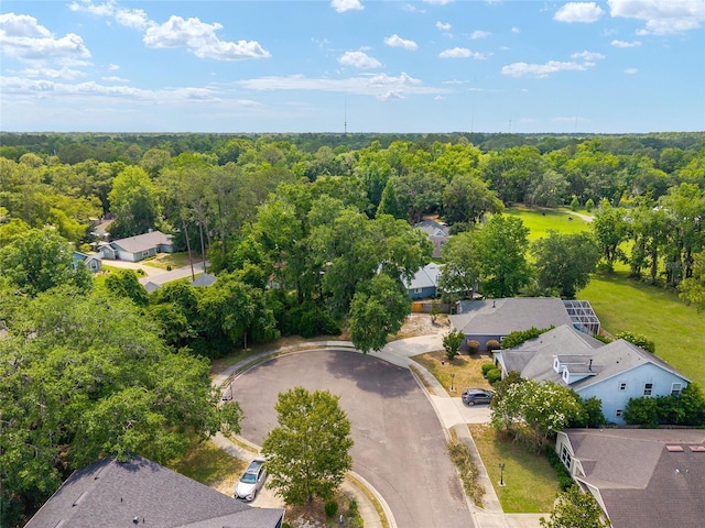 3664 NW 55th Ln, Gainesville, FL 32653 - aerial perspective of suburban area with a heavily wooded area