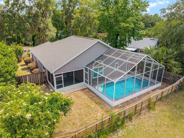 3664 NW 55th Ln, Gainesville, FL 32653 - view of swimming pool featuring glass enclosure and a patio area