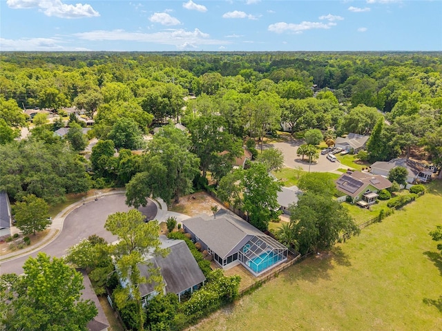 3664 NW 55th Ln, Gainesville, FL 32653 - aerial view of residential area with a heavily wooded area