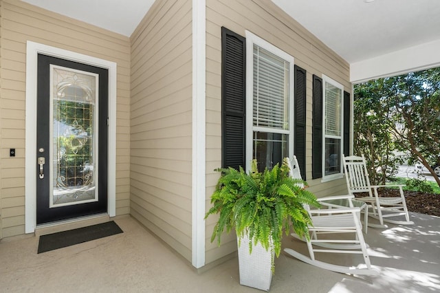 doorway to property featuring a porch